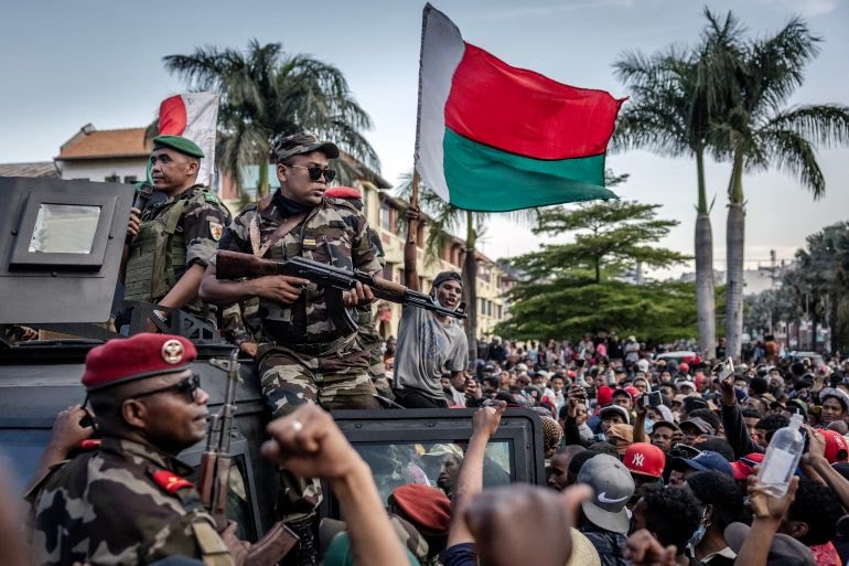Madagascar army unit asserts control as president claims power grab. Elite troops join youth-led protests over utilities that have escalated into the most severe threat to President Andry Rajoelina's government.